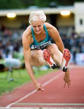 Carolina Klüft mitt i hoppet. Foto: Björn Larsson Rosvall/Scanpix