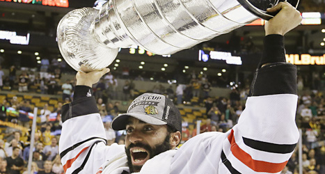 Svensken Johnny Odoya jublar över segern i Stanley Cup.
Foto: Elise Amdeola/Scanpix.