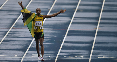 Usain Bolt vann finalen på 100 meter. Någon rekordtid blev det inte. Det regnade alldeles för mycket. Bolt vann på 9.77 sekunder. Foto: Martin Meissner/Scanpix