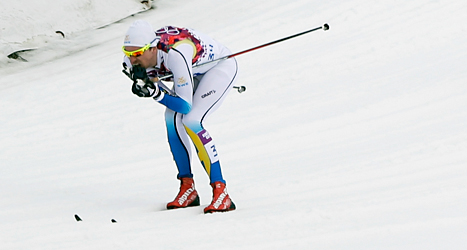 Johan Olsson tog silver i sitt första lopp efter skadan. Foto: Matthias Schrader /TT