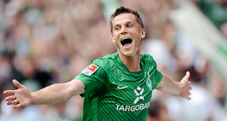 Markus Rosenberg jublar över mål i den tyska fotbollsligan. Foto:
Martin Meissner/TT.