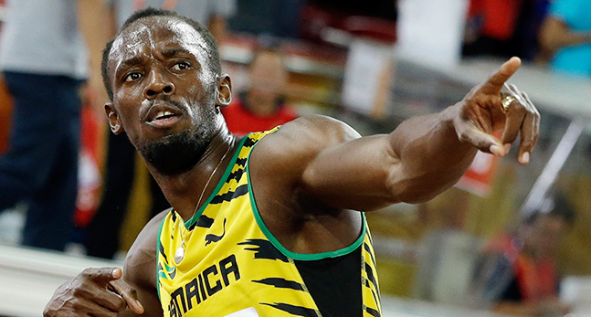 Usain Bolt springer i mål