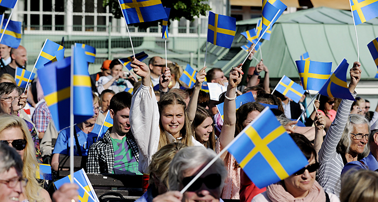 Folk med flaggor