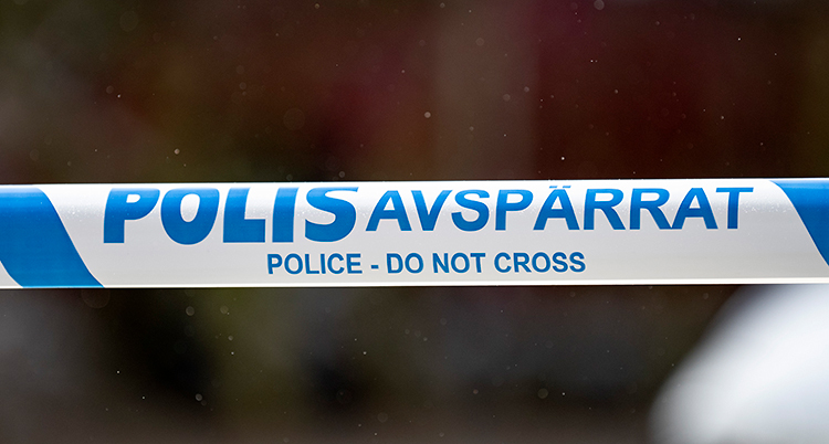 Polisens blå avspärrningsband.