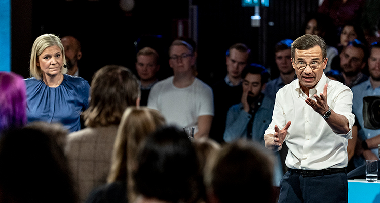 Andersson och Kristersson inne i en debatt.
