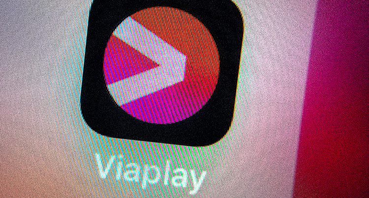 Viaplays symbol på en skärm till en mobiltelefon.