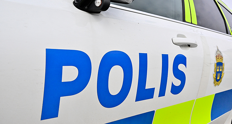 En nära bild på en polisbil.