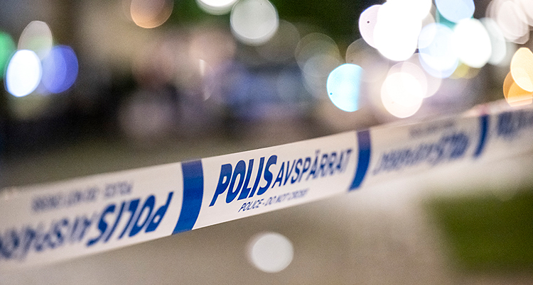 ett polisband som spärrar av något.