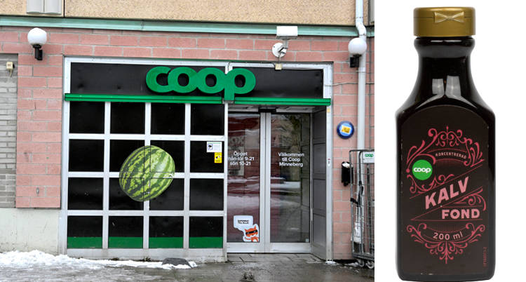 En ingång till en affär och en flaska fond.