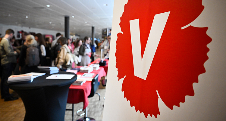 Vänsterpartiets symbol är en röd blomma med ett V.